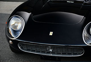 Close-up of the front of a classic Ferrari sourced by Sandbox Motors