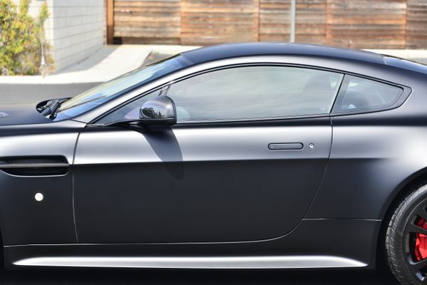 2012 Aston Martin V12 Vantage Carbon Black sold by Sandbox Motors