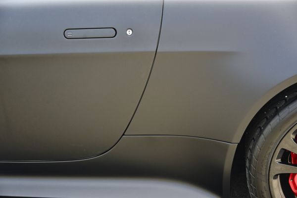 2012 Aston Martin V12 Vantage Carbon Black sold by Sandbox Motors