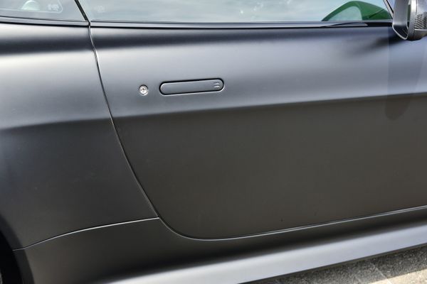 2012 Aston Martin V12 Vantage Carbon Black sold by Sandbox Motors