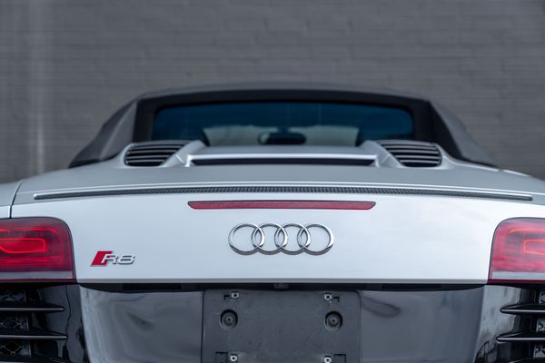 2014 Audi R8 V10 Spyder Quattro S Tronic in Ice Silver Metallic previously sold by Sandbox Motors