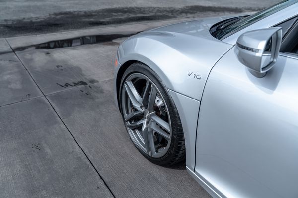 2014 Audi R8 V10 Spyder Quattro S Tronic in Ice Silver Metallic previously sold by Sandbox Motors