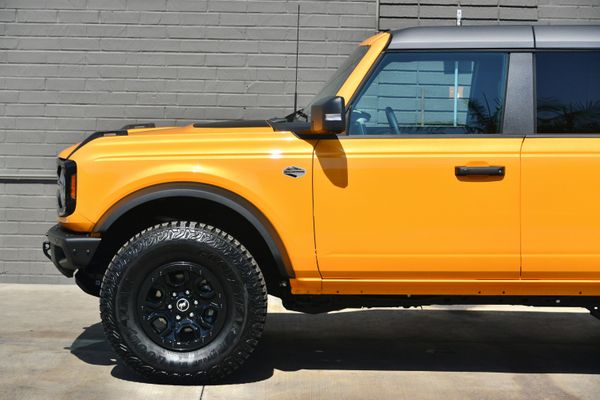 2022 Ford Bronco Wildtrak V6 4-Door, Cyber Orange Metallic, previously sold by Sandbox Motors