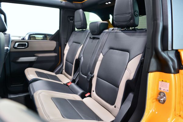 2022 Ford Bronco Wildtrak V6 4-Door, Cyber Orange Metallic, previously sold by Sandbox Motors