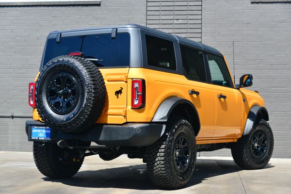 2022 Ford Bronco Wildtrak V6 4-Door, Cyber Orange Metallic, previously sold by Sandbox Motors