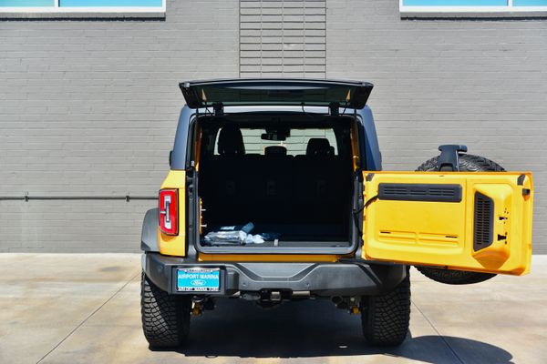 2022 Ford Bronco Wildtrak V6 4-Door, Cyber Orange Metallic, previously sold by Sandbox Motors