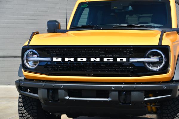2022 Ford Bronco Wildtrak V6 4-Door, Cyber Orange Metallic, previously sold by Sandbox Motors