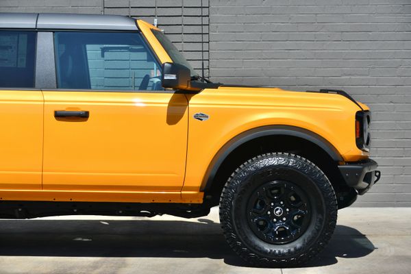 2022 Ford Bronco Wildtrak V6 4-Door, Cyber Orange Metallic, previously sold by Sandbox Motors