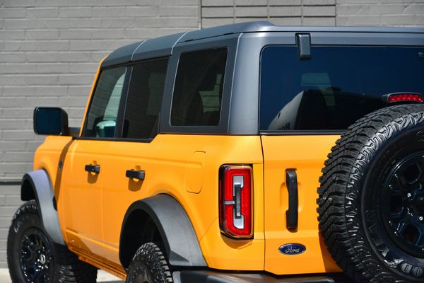 2022 Ford Bronco Wildtrak V6 4-Door, Cyber Orange Metallic, previously sold by Sandbox Motors