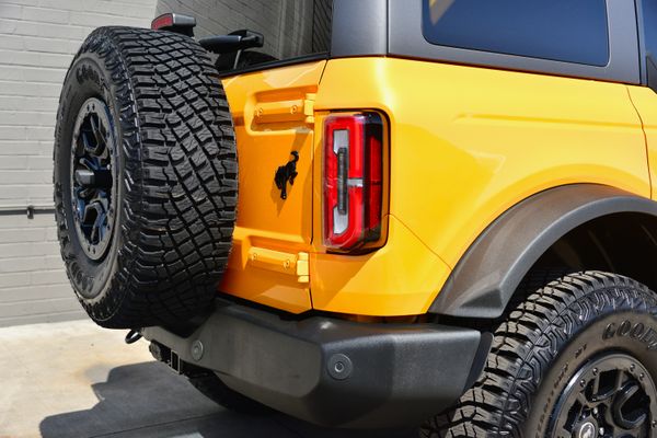 2022 Ford Bronco Wildtrak V6 4-Door, Cyber Orange Metallic, previously sold by Sandbox Motors