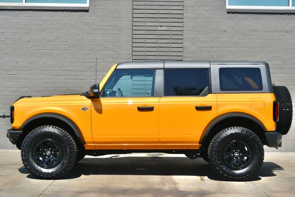 2022 Ford Bronco Wildtrak V6 4-Door, Cyber Orange Metallic, previously sold by Sandbox Motors