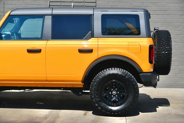 2022 Ford Bronco Wildtrak V6 4-Door, Cyber Orange Metallic, previously sold by Sandbox Motors