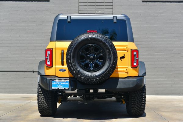 2022 Ford Bronco Wildtrak V6 4-Door, Cyber Orange Metallic, previously sold by Sandbox Motors