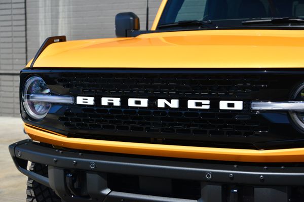 2022 Ford Bronco Wildtrak V6 4-Door, Cyber Orange Metallic, previously sold by Sandbox Motors