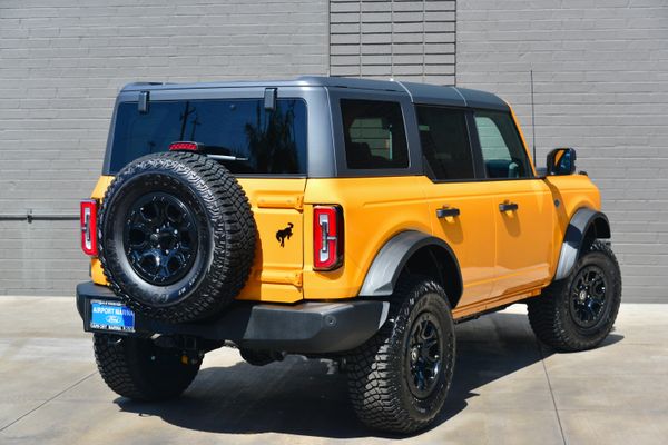 2022 Ford Bronco Wildtrak V6 4-Door, Cyber Orange Metallic, previously sold by Sandbox Motors