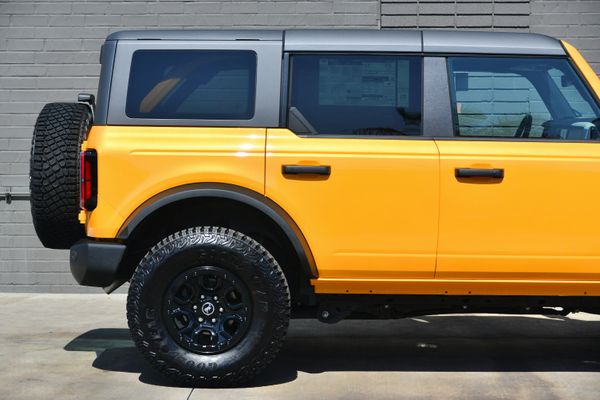 2022 Ford Bronco Wildtrak V6 4-Door, Cyber Orange Metallic, previously sold by Sandbox Motors
