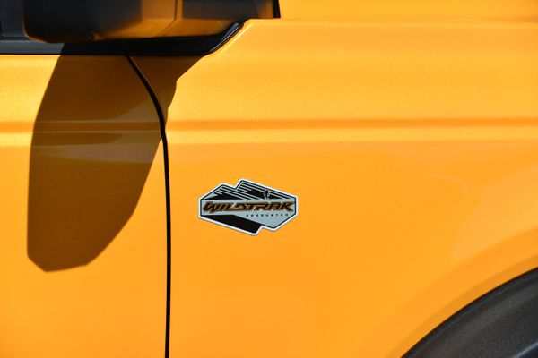 2022 Ford Bronco Wildtrak V6 4-Door, Cyber Orange Metallic, previously sold by Sandbox Motors