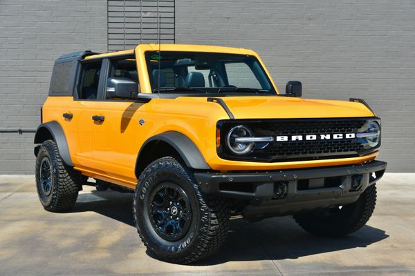 2022 Ford Bronco Wildtrak V6 4-Door, Cyber Orange Metallic, previously sold by Sandbox Motors