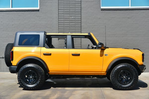 2022 Ford Bronco Wildtrak V6 4-Door, Cyber Orange Metallic, previously sold by Sandbox Motors