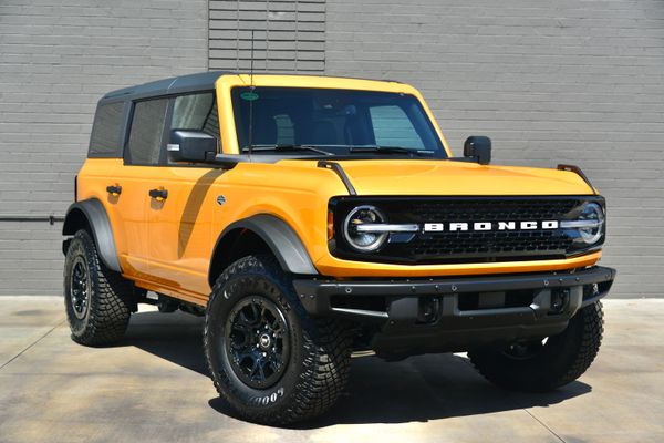 2022 Ford Bronco Wildtrak V6 4-Door, Cyber Orange Metallic, previously sold by Sandbox Motors