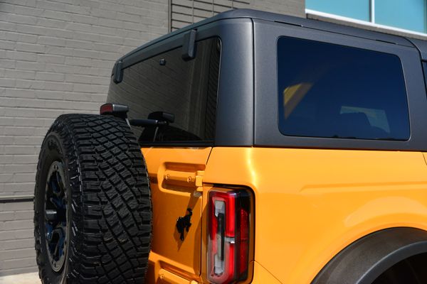 2022 Ford Bronco Wildtrak V6 4-Door, Cyber Orange Metallic, previously sold by Sandbox Motors