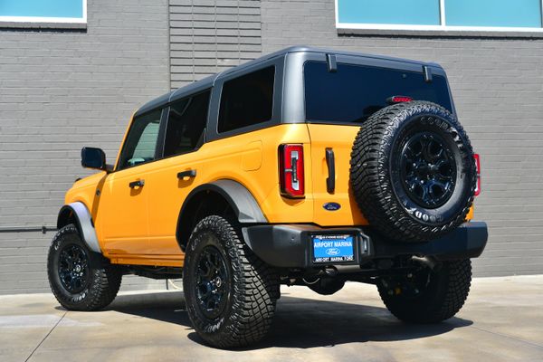 2022 Ford Bronco Wildtrak V6 4-Door, Cyber Orange Metallic, previously sold by Sandbox Motors