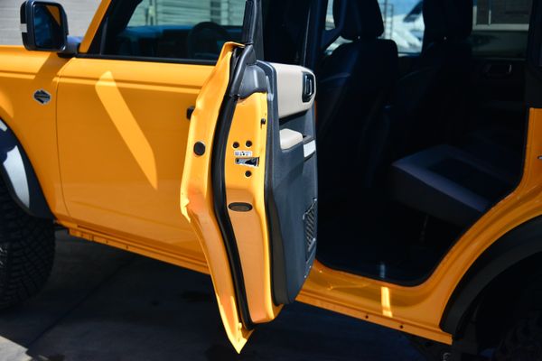 2022 Ford Bronco Wildtrak V6 4-Door, Cyber Orange Metallic, previously sold by Sandbox Motors