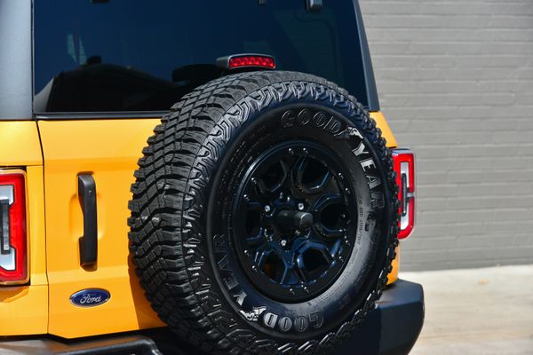 2022 Ford Bronco Wildtrak V6 4-Door, Cyber Orange Metallic, previously sold by Sandbox Motors