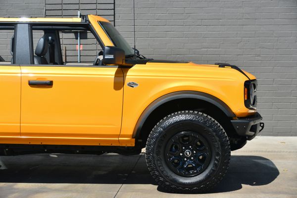 2022 Ford Bronco Wildtrak V6 4-Door, Cyber Orange Metallic, previously sold by Sandbox Motors