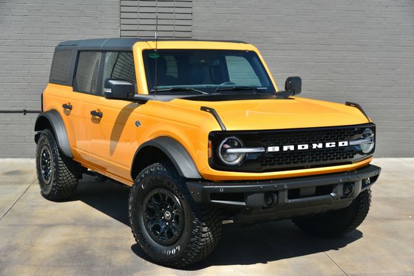 2022 Ford Bronco Wildtrak V6 4-Door, Cyber Orange Metallic, previously sold by Sandbox Motors