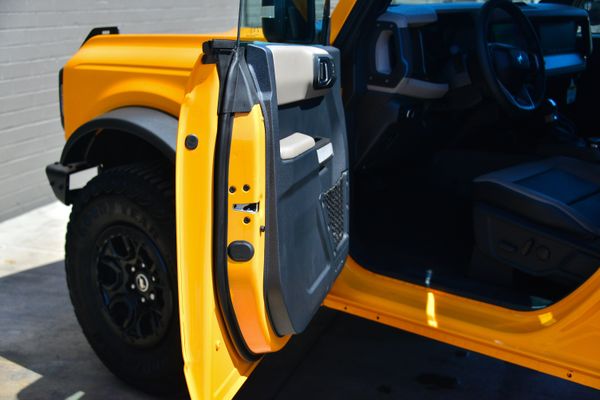 2022 Ford Bronco Wildtrak V6 4-Door, Cyber Orange Metallic, previously sold by Sandbox Motors