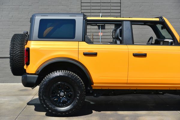 2022 Ford Bronco Wildtrak V6 4-Door, Cyber Orange Metallic, previously sold by Sandbox Motors