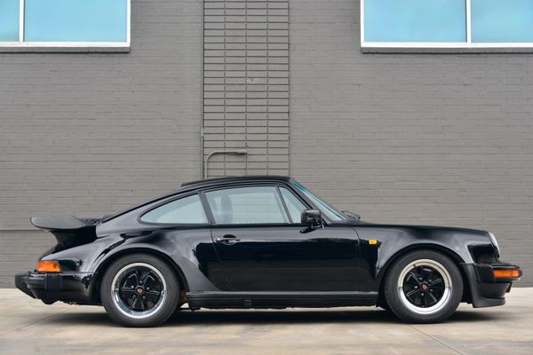 1985 Porsche 930 for sale and sold by Sandbox Motors. A stunning black Turbo Coupe.