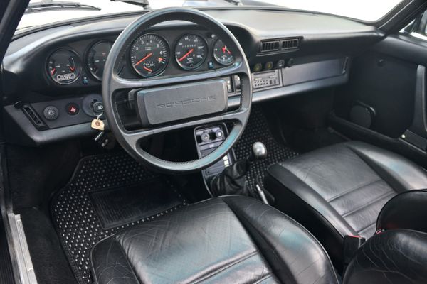 1985 Porsche 930 for sale and sold by Sandbox Motors. A stunning black Turbo Coupe.
