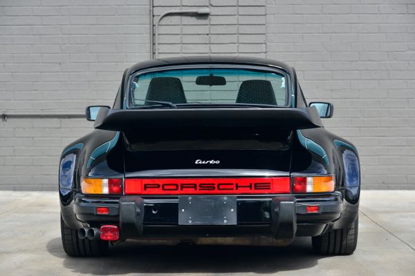 1985 Porsche 930 for sale and sold by Sandbox Motors. A stunning black Turbo Coupe.