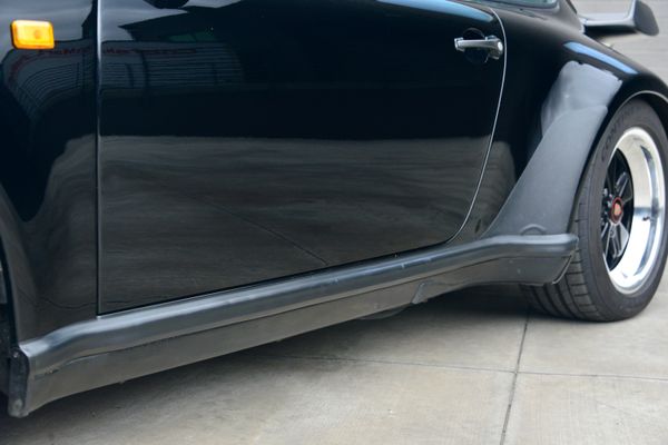 1985 Porsche 930 for sale and sold by Sandbox Motors. A stunning black Turbo Coupe.