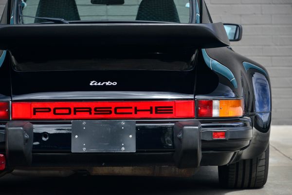 1985 Porsche 930 for sale and sold by Sandbox Motors. A stunning black Turbo Coupe.