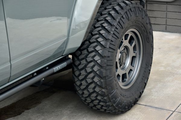 2022 Ford Bronco Wildtrak V6 4-Door, gray with orange accents, previously sold by Sandbox Motors