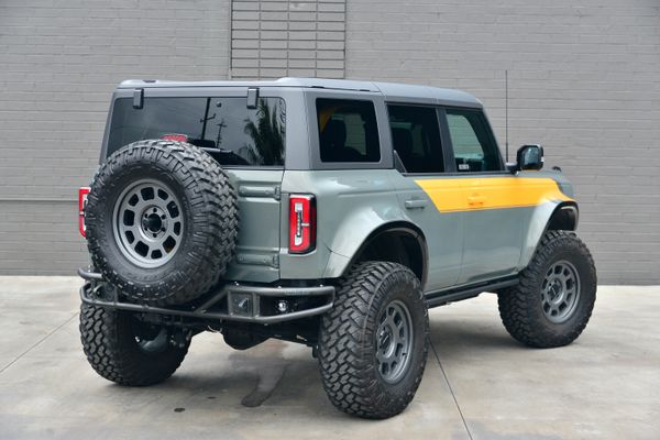 2022 Ford Bronco Wildtrak V6 4-Door, gray with orange accents, previously sold by Sandbox Motors