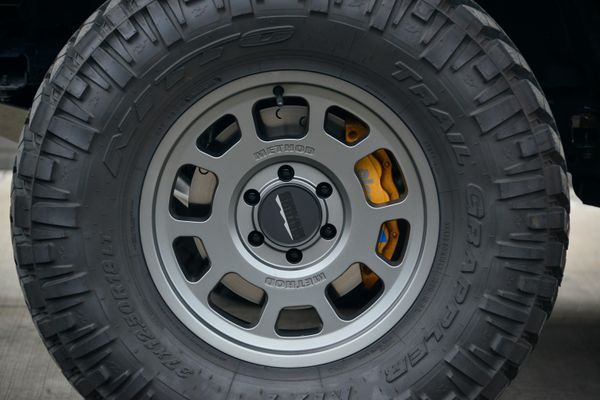 2022 Ford Bronco Wildtrak V6 4-Door, gray with orange accents, previously sold by Sandbox Motors