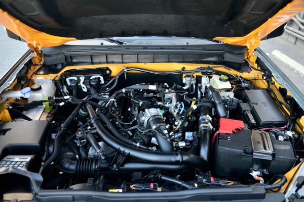 2022 Ford Bronco Wildtrak V6 4-Door, gray with orange accents, previously sold by Sandbox Motors