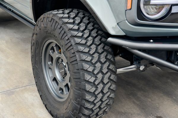 2022 Ford Bronco Wildtrak V6 4-Door, gray with orange accents, previously sold by Sandbox Motors