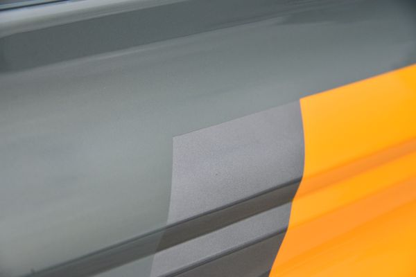 2022 Ford Bronco Wildtrak V6 4-Door, gray with orange accents, previously sold by Sandbox Motors