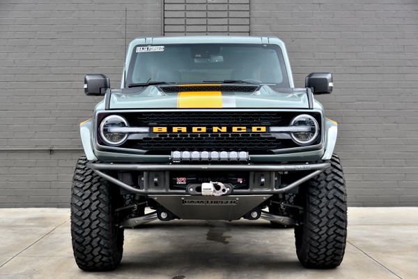 2022 Ford Bronco Wildtrak V6 4-Door, gray with orange accents, previously sold by Sandbox Motors