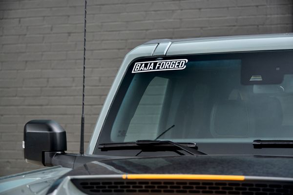 2022 Ford Bronco Wildtrak V6 4-Door, gray with orange accents, previously sold by Sandbox Motors