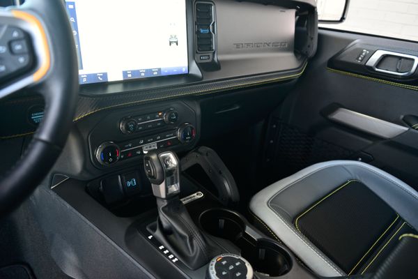 2022 Ford Bronco Wildtrak V6 4-Door, gray with orange accents, previously sold by Sandbox Motors