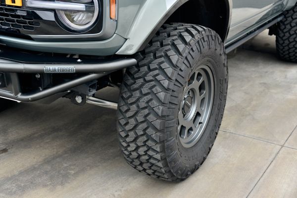 2022 Ford Bronco Wildtrak V6 4-Door, gray with orange accents, previously sold by Sandbox Motors