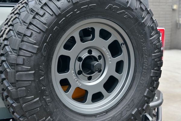 2022 Ford Bronco Wildtrak V6 4-Door, gray with orange accents, previously sold by Sandbox Motors