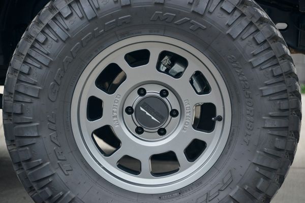2022 Ford Bronco Wildtrak V6 4-Door, gray with orange accents, previously sold by Sandbox Motors