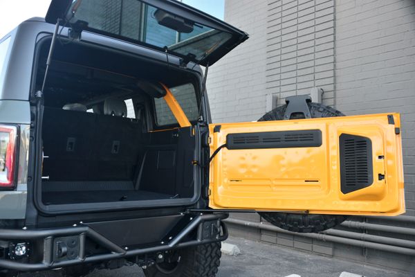 2022 Ford Bronco Wildtrak V6 4-Door, gray with orange accents, previously sold by Sandbox Motors